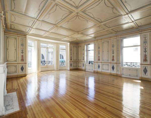 One of several entertainment areas with coffered ceilings.