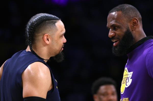 LeBron James (r.) co<em></em>nfronts Dillon Brooks (l.) before Game 3.