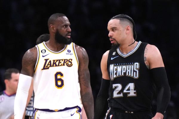 LeBron James and Dillon Brooks in the second quarter during Game 3 of the Lakers-Grizzlies series.