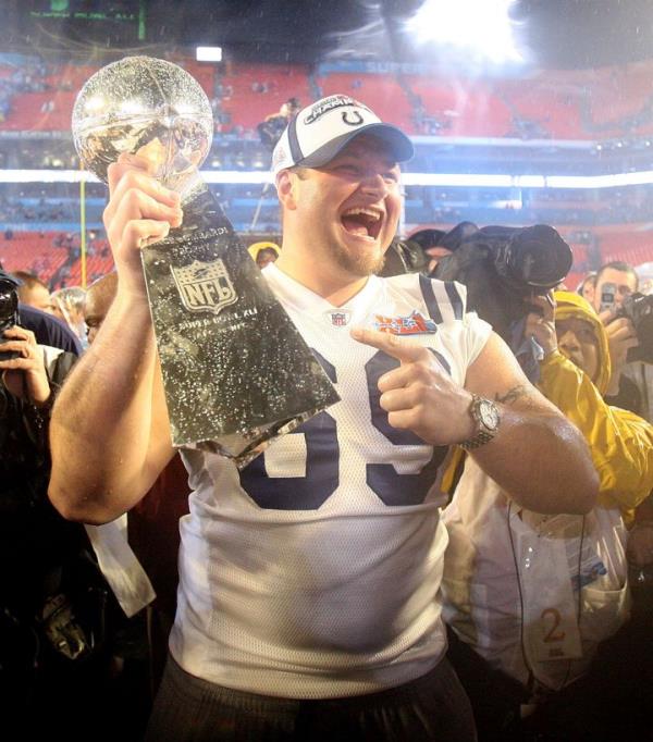 Matt Ulrich hoists the Lombardi Trophy to celebrate a 29-17 victory over the Chicago Bears in Super Bowl XLI in Miami, Florida, on Sunday, February 4, 2007. 