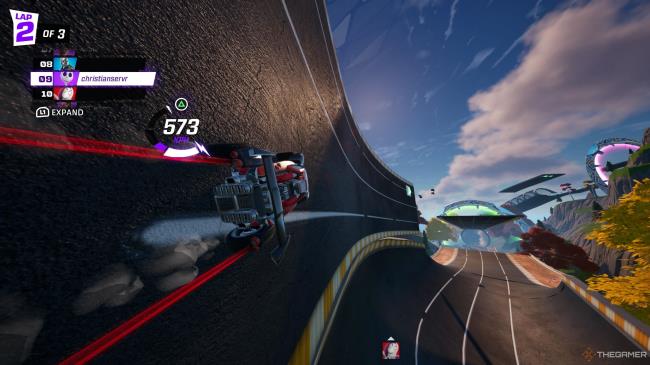 A screenshot from Rocket Racing showing the player character's car sticking to a sideways track