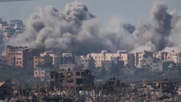 Smoke rises after an Israeli air strike on the Gaza Strip on November 21, 2023. [Leo Correa/AP Photo]