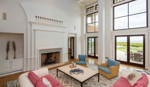 The expansive living room with high ceilings. 