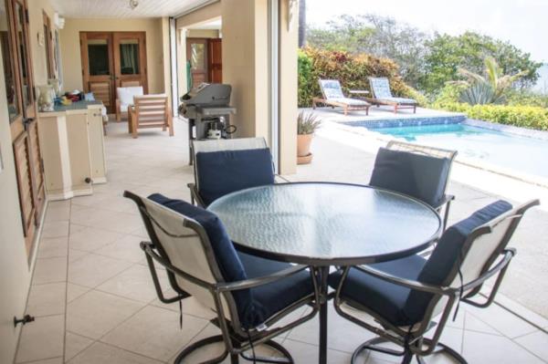 The breakfast area leads out to the pool. 