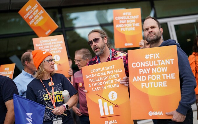 Medical co<em></em>nsultant members of the British Medical Association on the picket line outside Queen Elizabeth Hospital Birmingham