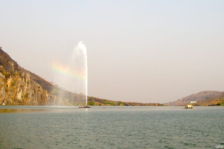 A fountain of carbon dioxide-rich water is emitted from the depths of Lake Nyos during the degassing process.