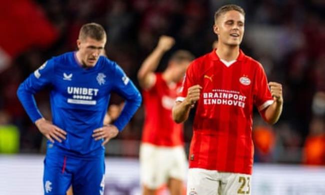 PSV celebrate beating Rangers in a Champions League playoff