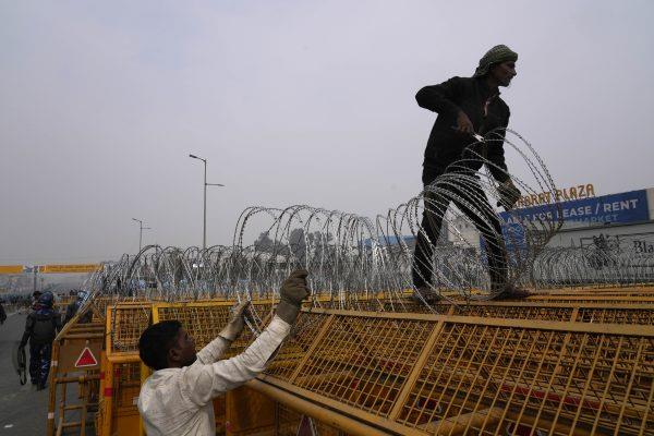 Police Tear Gas Indian Farmers Marching to New Delhi