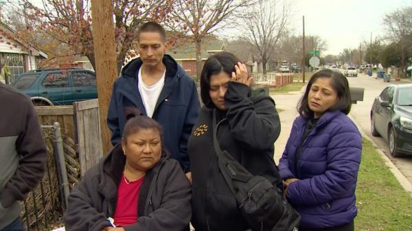 Elizabel Cardenas, center, seen with her family 