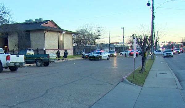 Police seen at the scene of the fatal shooting in Dallas on Dec. 30