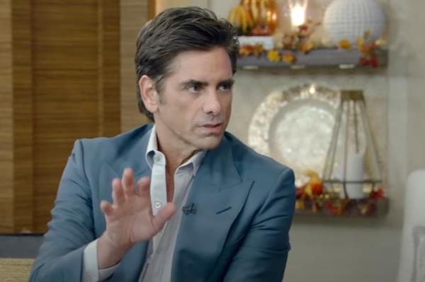 John Stamos talking. 