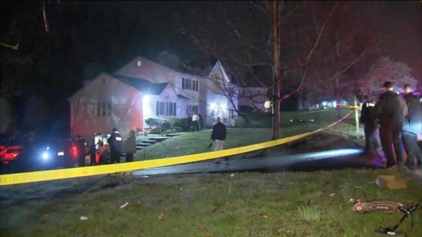 Police are seen respo<em></em>nding to the home in New City, New York.