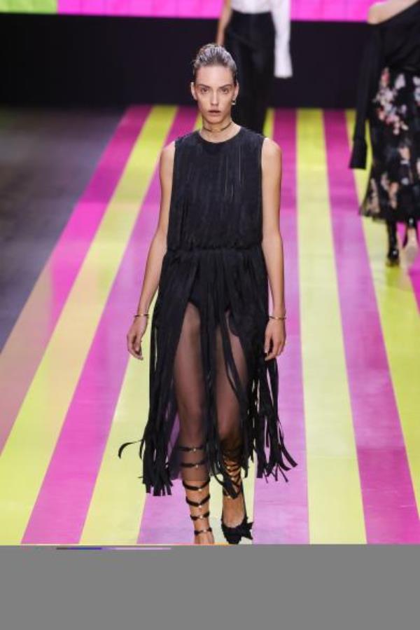 Christian Dior model wearing black fringed dress