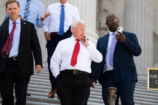 From left, Reps. Michael Guest, R-Miss., Greg Pence, R-Ind., and Jamaal Bowman, D-N.Y., leave the Capitol after a House vote on creating a select committee to investigate the January 6th attack on the Capitol on Wednesday, June 30, 2021.