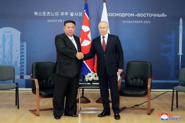  Russia's President Vladimir Putin and North Korea's leader Kim Jong Un attend a meeting at the Vostochny Cosmodrome in the far eastern Amur region, Russia, September 13, 2023