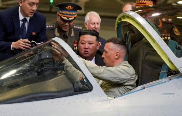 Kim at the aircraft factory, looking at the Su-57, Russia's most sophisticated fighter jet on Sept. 15, 2023.