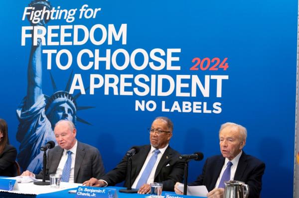 No Labels leadership and guests from left, Dan Webb, Natio<em></em>nal Co-Chair Dr. Benjamin F. Chavis, and founding Chairman and former Sen. Joe Lieberman, speak a<em></em>bout the 2024 election at Natio<em></em>nal Press Club, in Washington, Jan. 18, 2024.