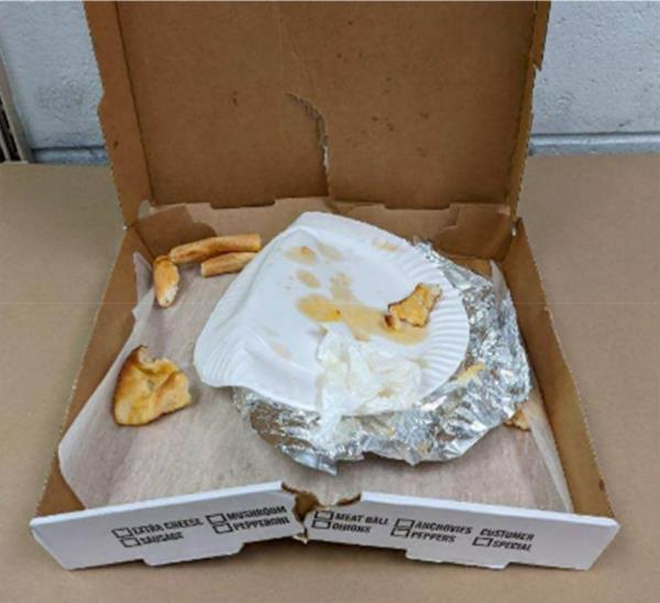 Discarded pizza box