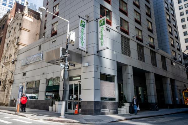 The Holiday Inn in the Financial District is charging the city $190 per room per night.