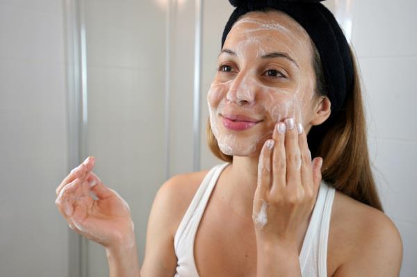 Woman washing face