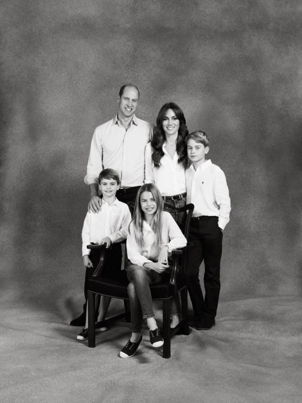 The photo, which captures Prince William, Kate Middleton and their three kids Prince George, 10, Princess Charlotte, 8, and Prince Louis, 5 in matching white and black outfits, was released Saturday through the couple's joint social media account. 