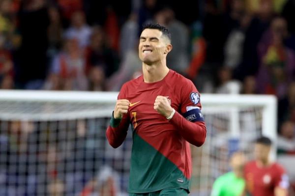 Portugal's Cristiano Ro<em></em>naldo celebrates at the end of the Euro 2024 group J qualifying soccer match between Portugal and Slovakia