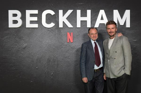 Director Fisher Stevens with David Beckham. 