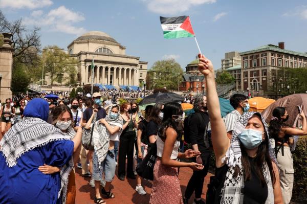 Students march and rally on Columbia University campus.