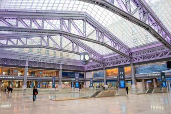 Moynihan train station with glass roof in Manhattan, New York during Covid-19 pandemic.