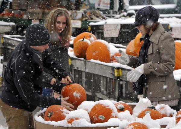 There must either be at least 1 inch of snow on the ground on the morning of Oct. 31 or falling snow must accumulate to at least 0.1 inches on that date in order for it to qualify as a white Halloween. 