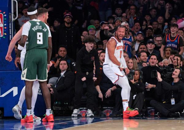 Knicks guard Jalen Brunson #11 reacts after hitting a shot during the first quarter