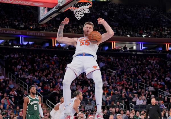 Knicks center Isaiah Hartenstein #55 slam the ball during the third quarter.