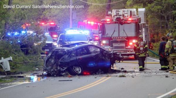 Jared Ravizza is removed from a crash scene on a stretcher in Cape Cod.