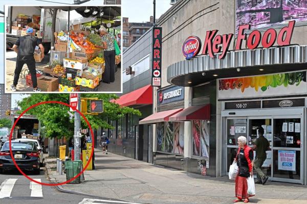 A fruit and vegetable stand (permit pictured) located on Queens Boulevard is set up approximately 40 - 60 feet away from the entrance to the Key Food Supermarket