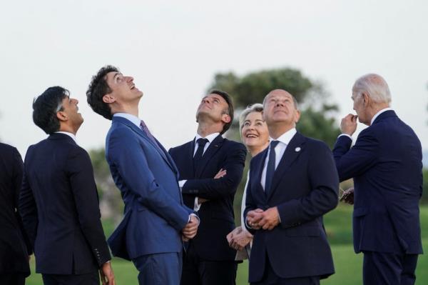 British Prime Minister Rishi Sunak, Canadian Prime Minister Justin Trudeau, French President Emmanuel Macron, European Commission President Ursula von der Leyen, German Chancellor Olaf Scholz and U.S President Joe Biden attend a skydiving demo<em></em>nstration on the first day of the G7 summit.