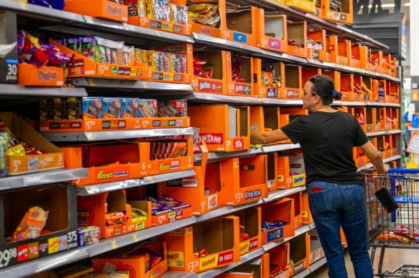 Grocery shopper buys candy