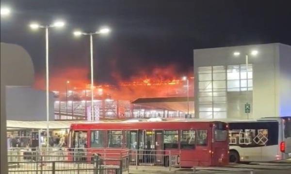 Screen grab taken with permission from video posted on Twitter by @Soriyn23 of a fire at a car park at Luton Airport. All flights at the airport have been suspended. Issue date: Tuesday October 10, 2023. PA Photo. See PA story FIRE Luton. Photo credit should read: SoRin/PA Wire NOTE TO EDITORS: This handout photo may o<em></em>nly be used in for editorial reporting purposes for the co<em></em>ntemporaneous illustration of events, things or the people in the image or facts mentio<em></em>ned in the caption. Reuse of the picture may require further permission from the copyright holder.