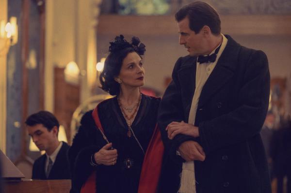 Coco Chanel (Juliette Binoche) co<em></em>nsorts with Nazi Spatz (Claes Bang) in a scene from 