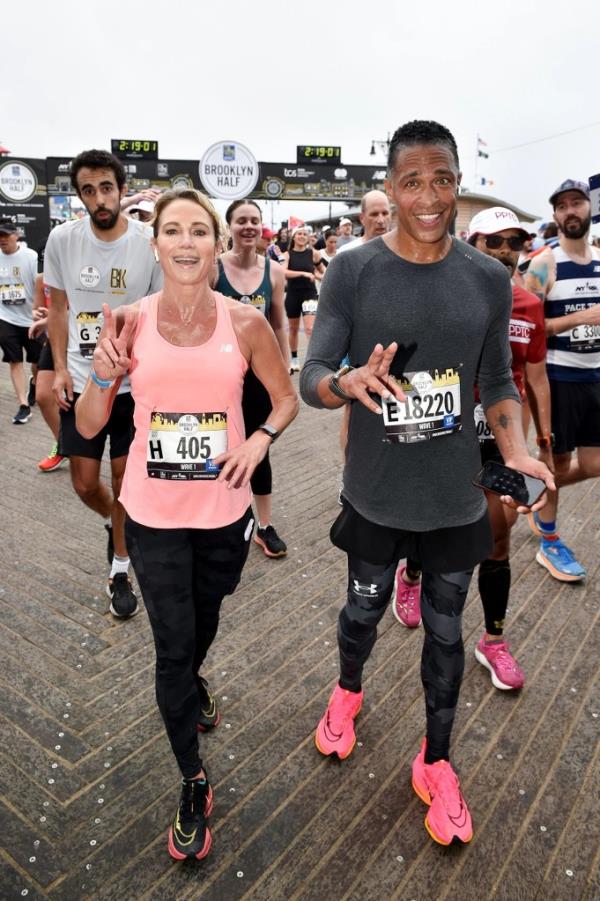 Amy Robach and TJ Holmes running together. 