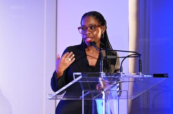 Rita Joseph standing at a podium during Georgie Badiel Foundation Water Ball event in New York City in September 2023.