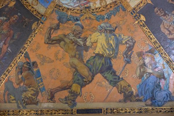 Paiting of man grabbing a Native American, mural on ceiling 