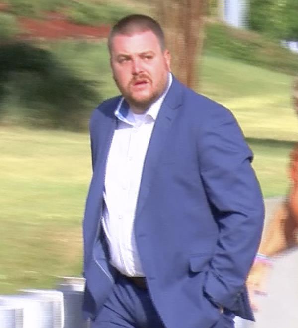 Christian Dedmon walking into the court house on August 3. 