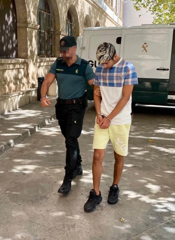 Detained French rape suspects arriving at Court in Palma yesterday.