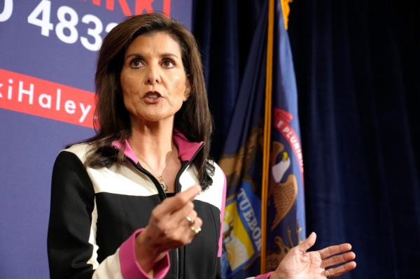 Republican presidential candidate former UN Ambassador Nikki Haley speaks with reporters ahead of a campaign rally on Monday, Feb. 26, 2024, in Grand Rapids, Michigan.  