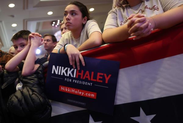 Audience members listen as Republican presidential candidate former U.N. Ambassador Nikki Haley speaks during a campaign event at the Amway Grand Plaza on February 26