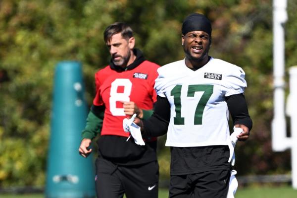 Jets wide receiver Davante Adams gestures during practice in Florham Park, NJ.  