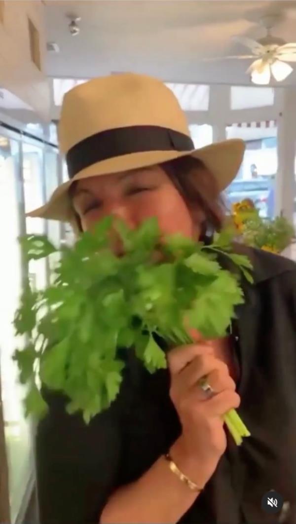 Woman who appears to be Marie Eiffel with parsley. 