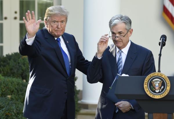 President Do<em></em>nald Trump signaling the end of a ceremony after nominating Jerome Powell as Chairman of the Federal Reserve in the Rose Garden, White House, 2017.