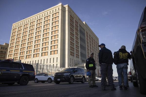 Federal enforcement officers standing outside the Metropolitan Detention Center in Brooklyn, New York, wher<em></em>e Sean 'Diddy' Combs is incarcerated.