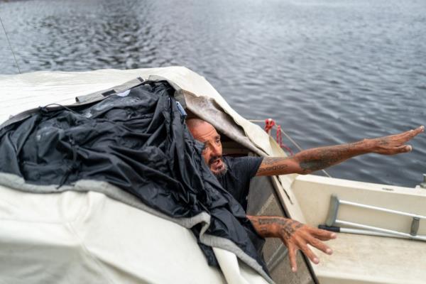 Joseph Malinowski on board his boat.